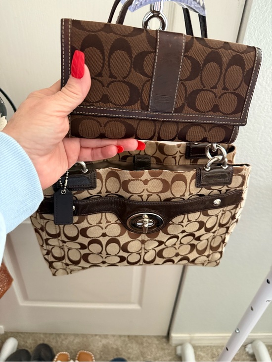 Coach Signature Canvas Shoulder Bag in Brown. Matching Coach wallet main image 0